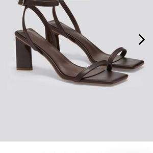 Brand new beautiful brown heels in size 12.